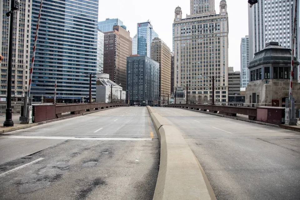Empty street and high-rise buildings in downtown Chicago, Illinois during COvid-19 pandemic.